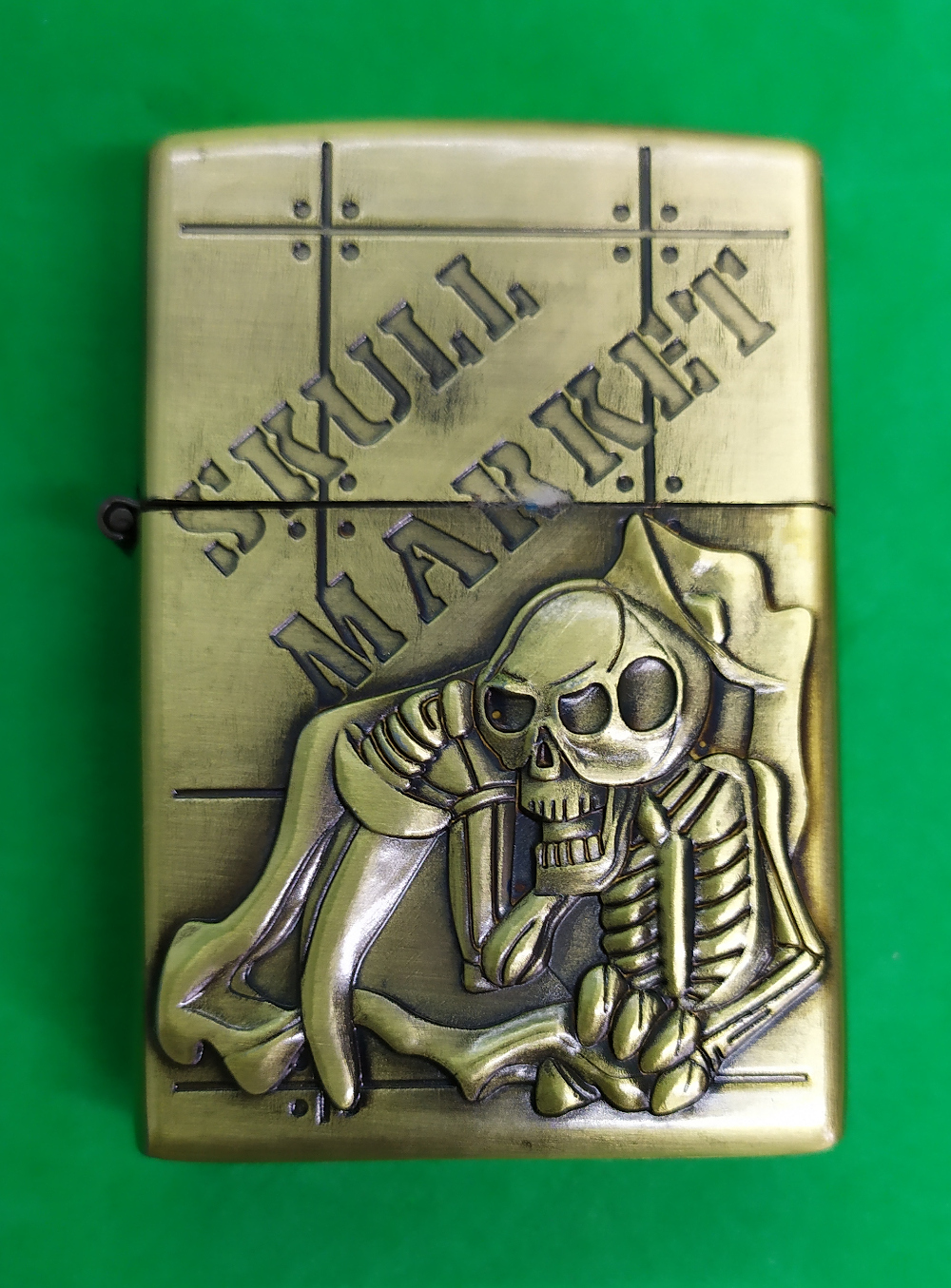 Bricheta aurie tip Zippo Skull Market model 4